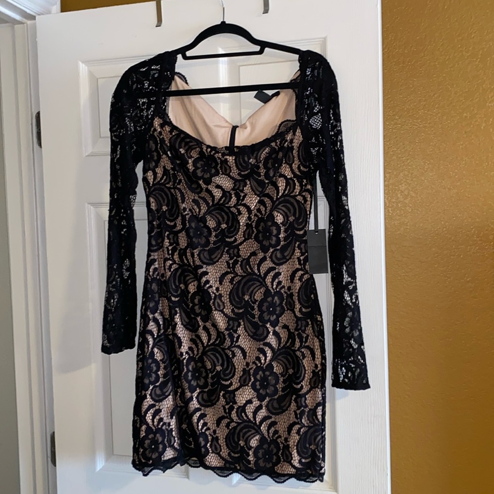 Hours long sleeve lace mini dresss. Party dress.